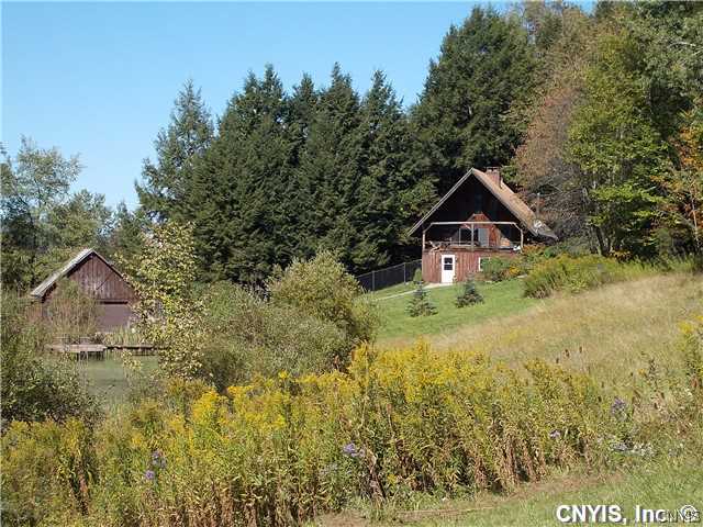 129 Horton Road Pitcher, NY 13136 - Photo 1 of 1 Exterior Front Three Level House, Barn/Garage, La