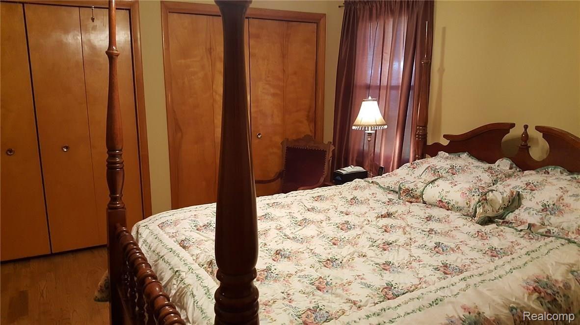 8992 Rucker Road Grosse Ile, MI 48138 - Photo 22 of 40 Master bedroom with double closets.