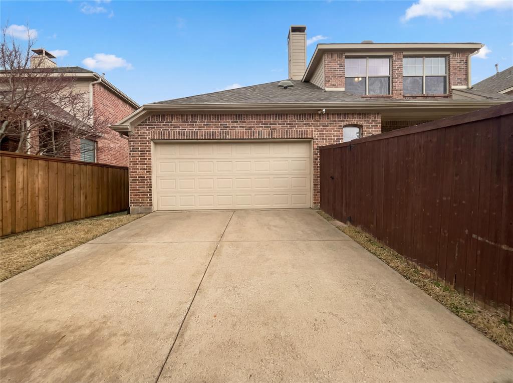 2128 Chambers Drive Allen, TX 75013 - Photo 22 of 23 a view of a house with a wooden fence
