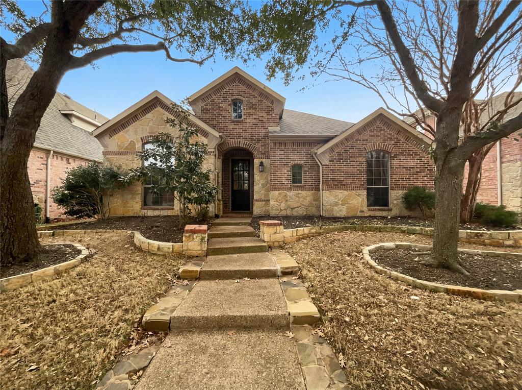 2128 Chambers Drive Allen, TX 75013 - Photo 6 of 23 a front view of a house with a yard