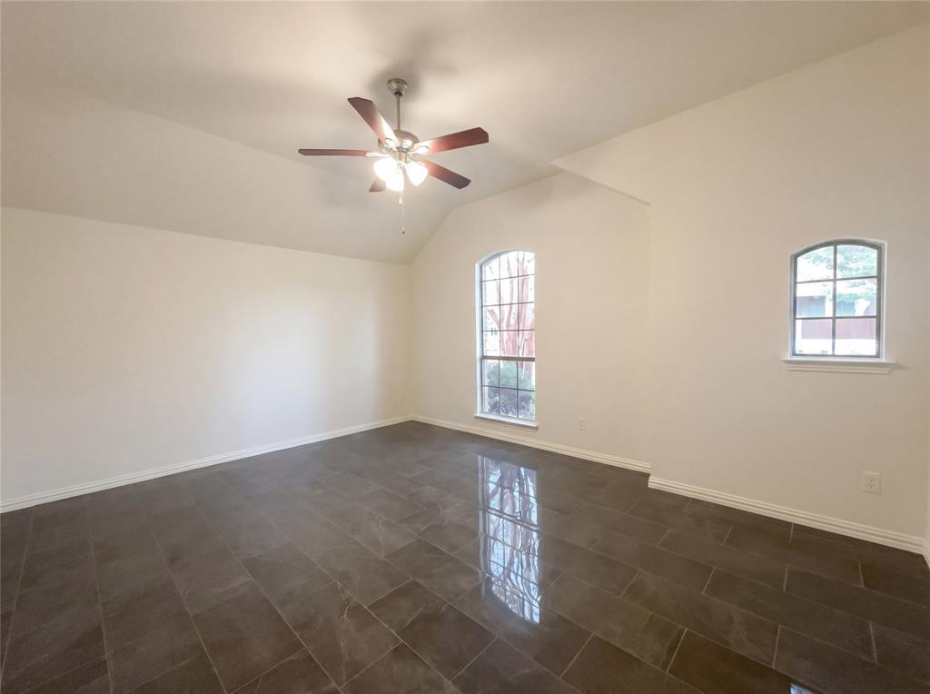 2128 Chambers Drive Allen, TX 75013 - Photo 9 of 23 a view of an empty room with a window