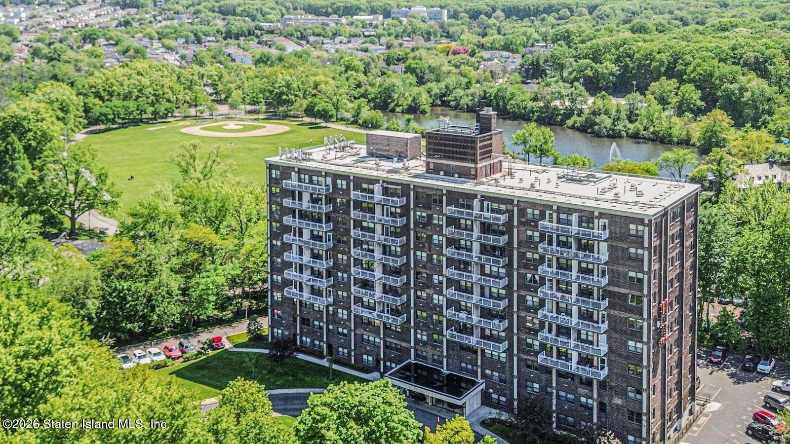 1100 Clove Road, Unit 5G Staten Island, NY 10301 - Photo 13 of 14 a view of a balcony with a yard