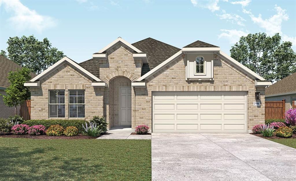 Single-story residence featuring a brick exterior with stone accents
