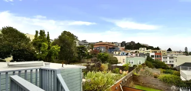 a view of a swimming pool with a patio and mountain view