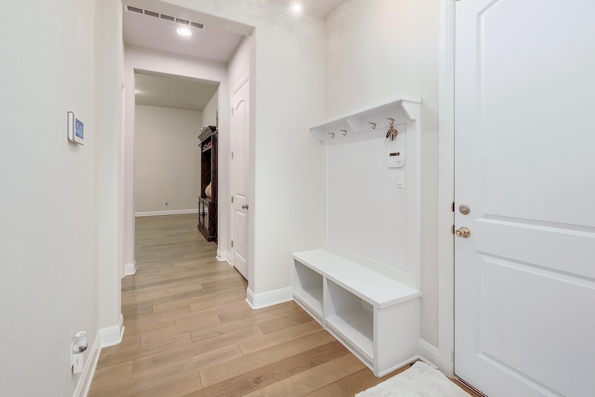 249 Axis Loop Georgetown, TX 78628 - Photo 28 of 36 a view of a hallway with closet and a bathtub
