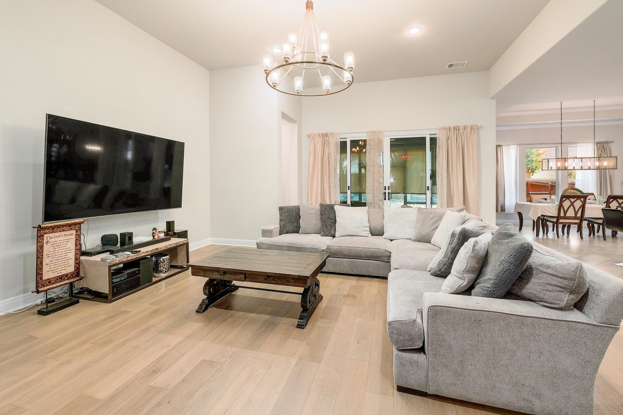 249 Axis Loop Georgetown, TX 78628 - Photo 3 of 36 a living room with furniture and a flat screen tv