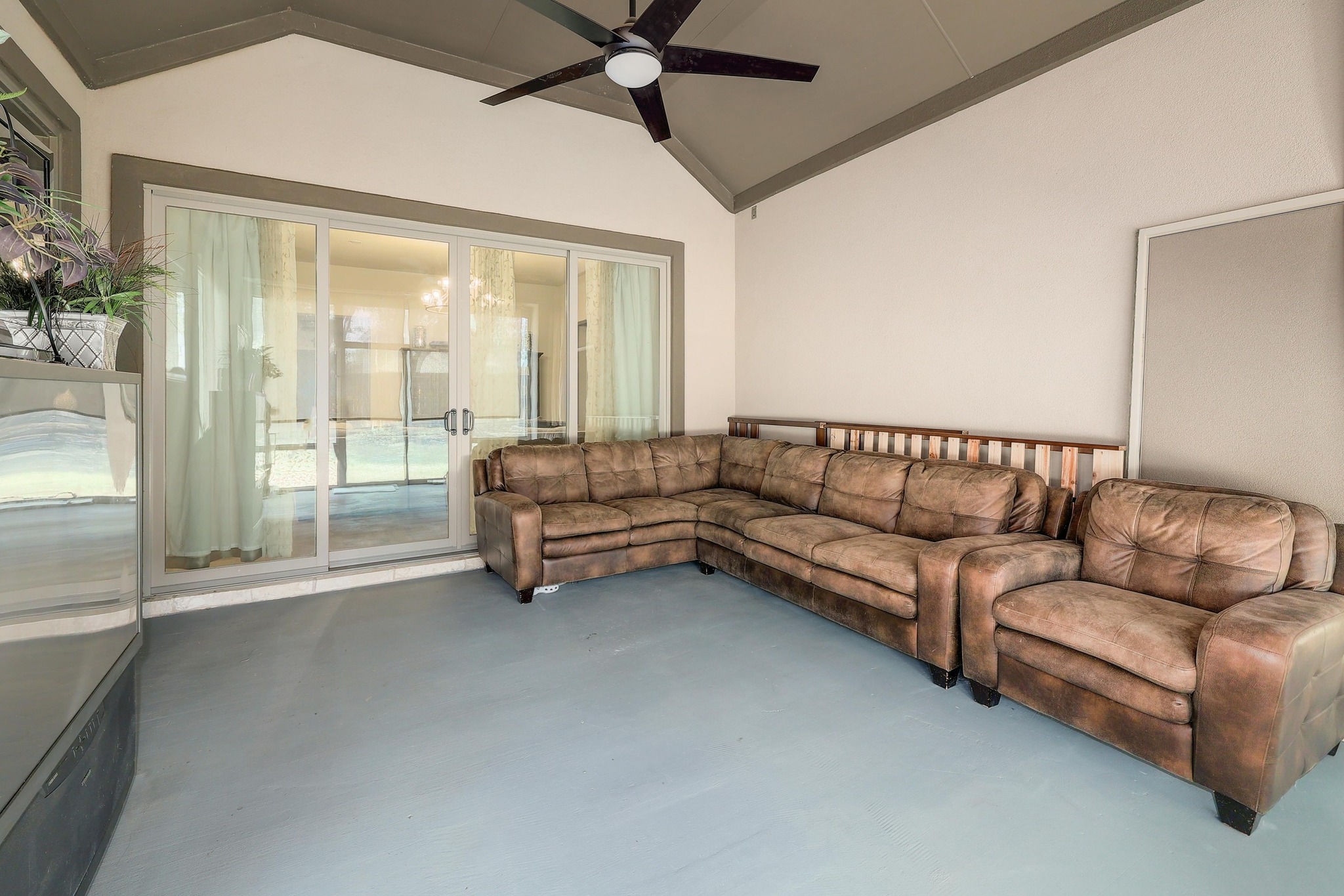 249 Axis Loop Georgetown, TX 78628 - Photo 31 of 36 a living room with furniture and a large window