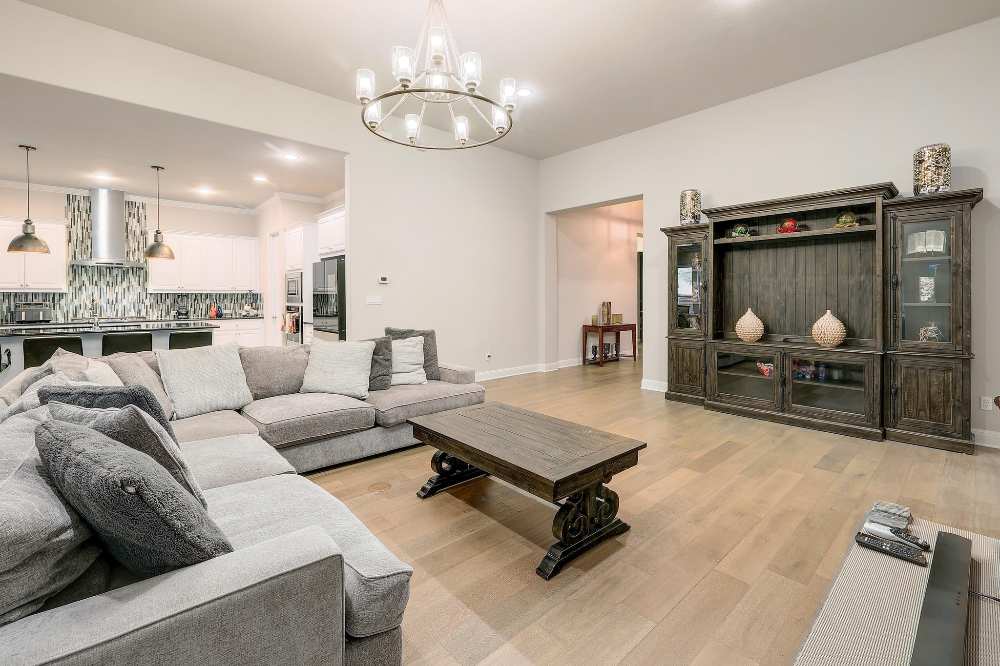 249 Axis Loop Georgetown, TX 78628 - Photo 5 of 36 a living room with furniture and a flat screen tv