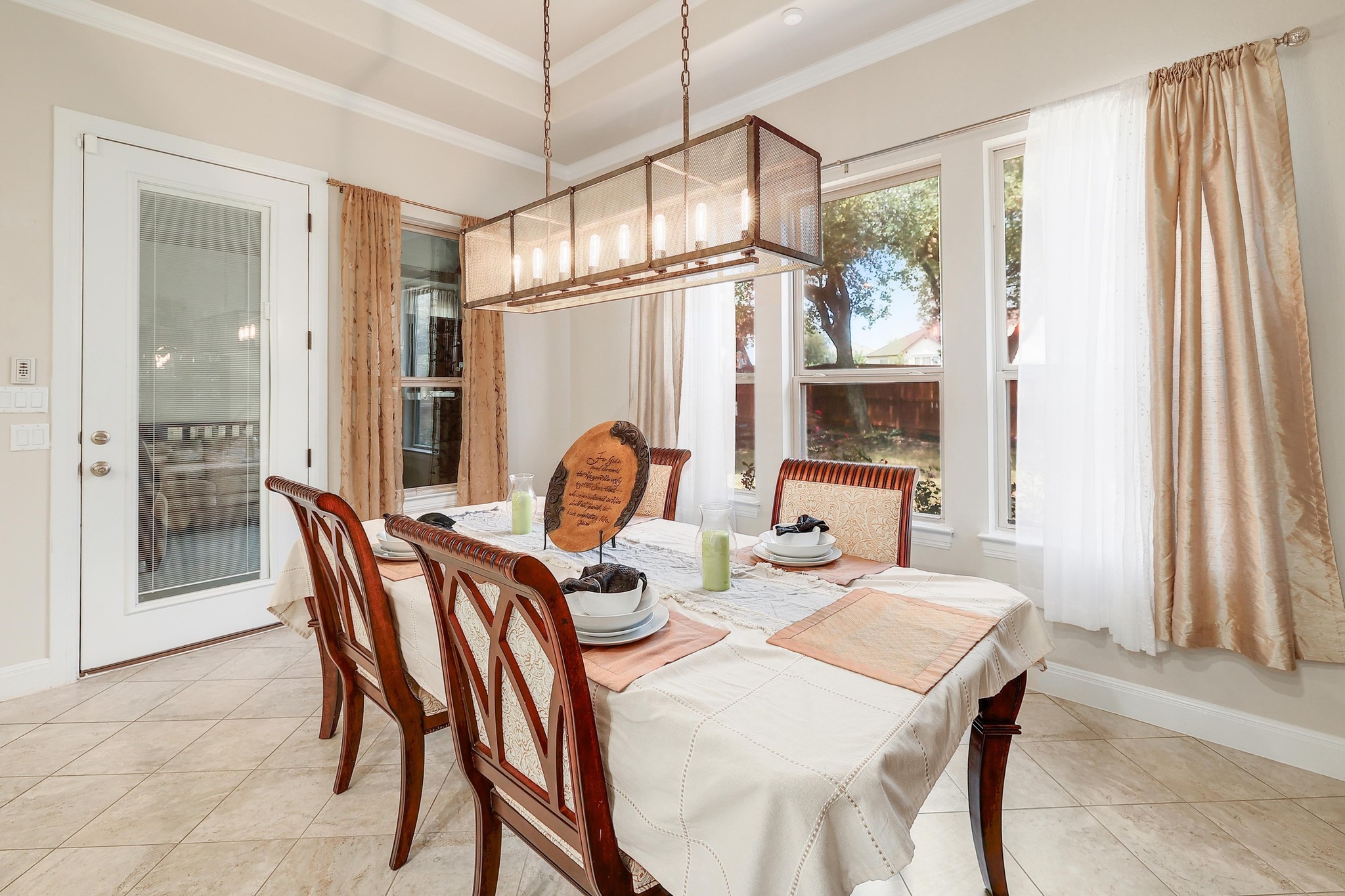 249 Axis Loop Georgetown, TX 78628 - Photo 6 of 36 a dining room with furniture window wooden floor