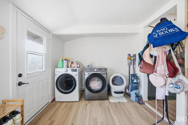 a view of a storage & utility room with racks on the wall