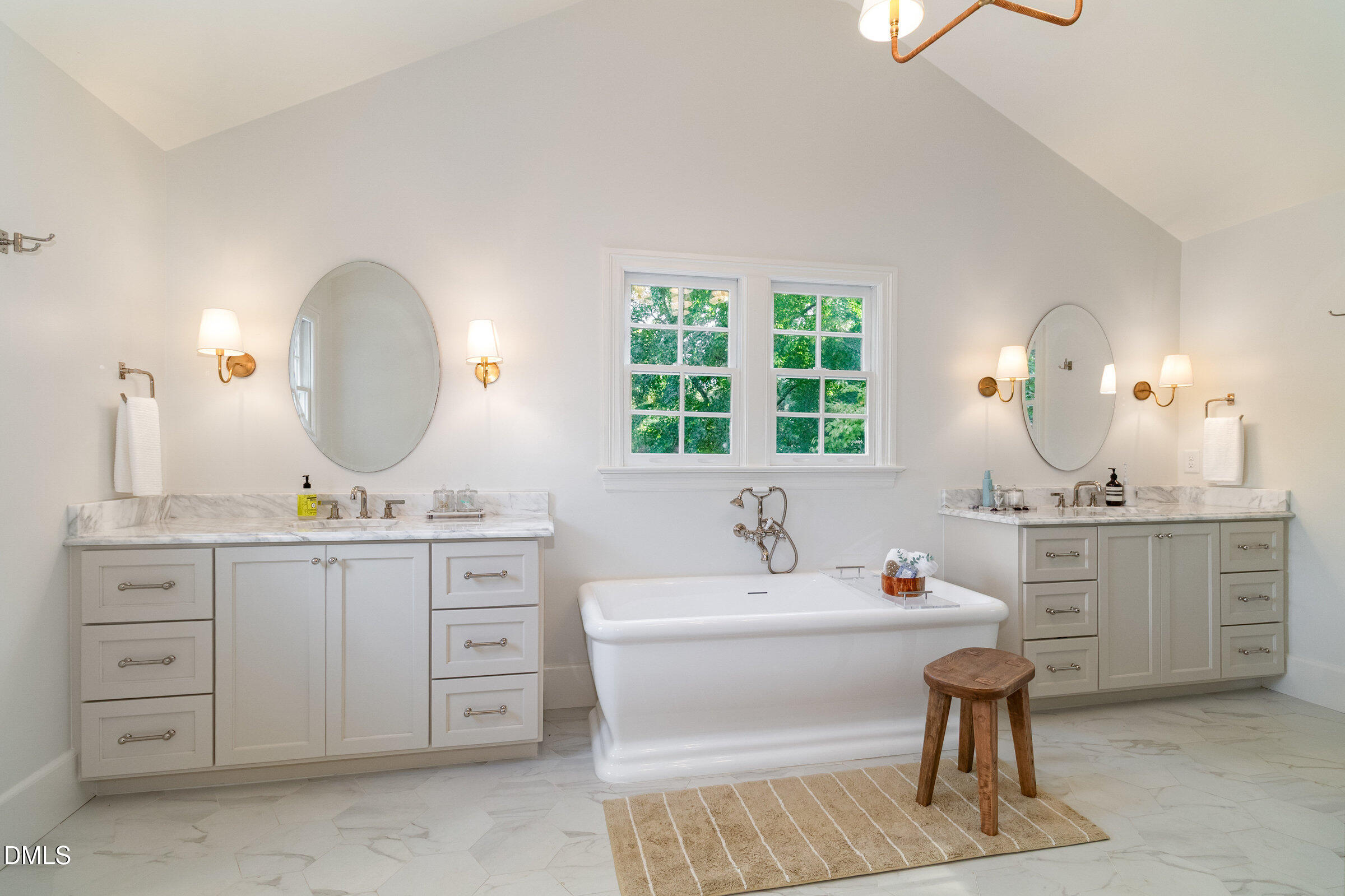 2404 Beechridge Road Raleigh, NC 27608 - Photo 24 of 52 a bathroom with a granite countertop sink and a mirror