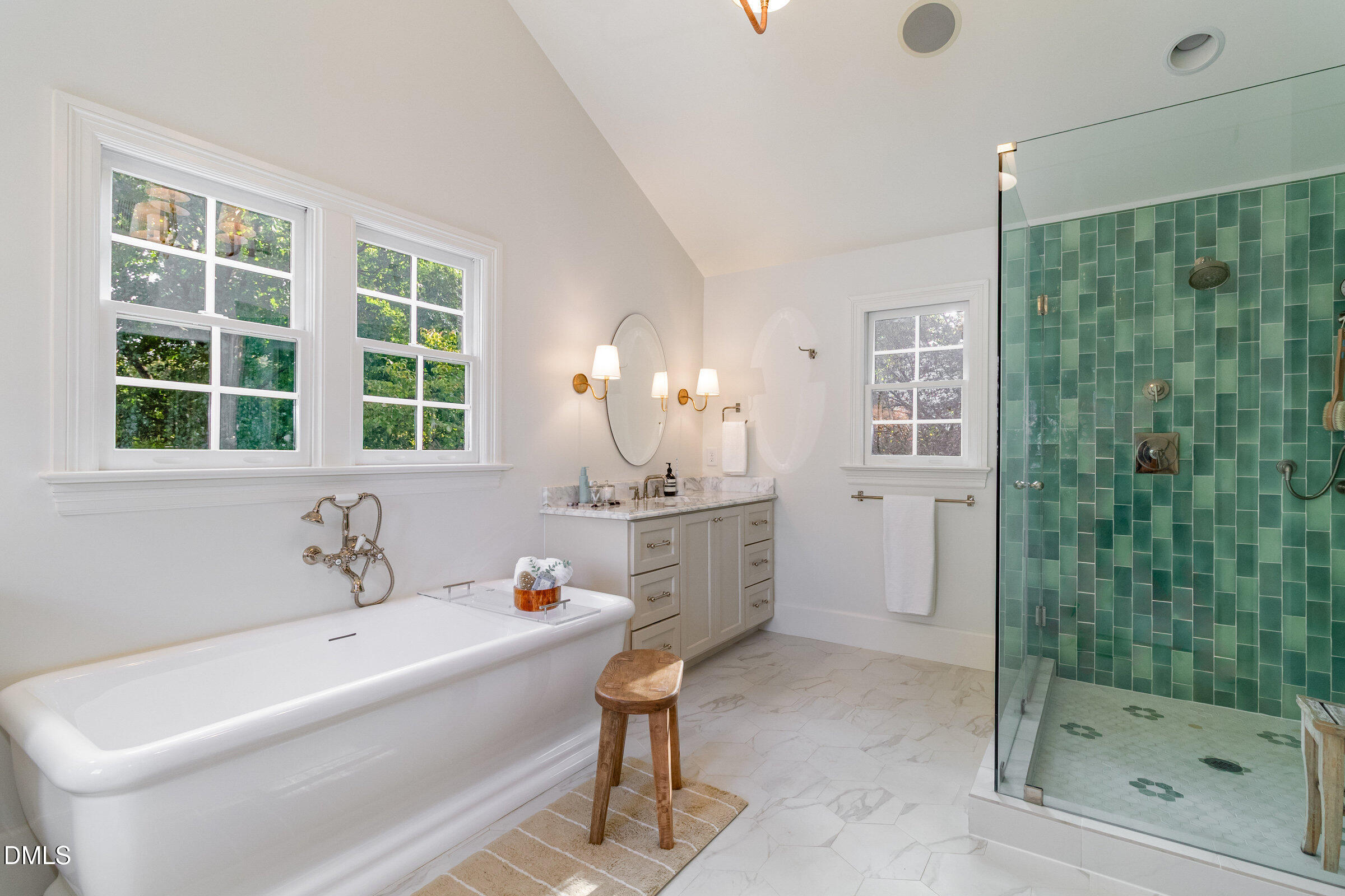 2404 Beechridge Road Raleigh, NC 27608 - Photo 26 of 52 a bathroom with a sink a toilet and shower