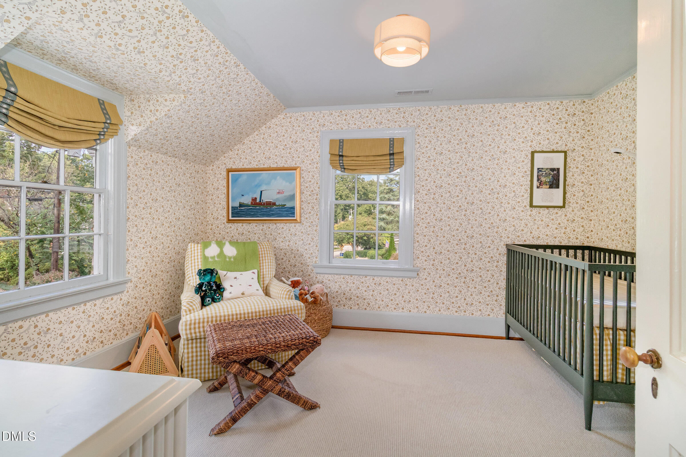 2404 Beechridge Road Raleigh, NC 27608 - Photo 28 of 52 a living room with furniture and a window