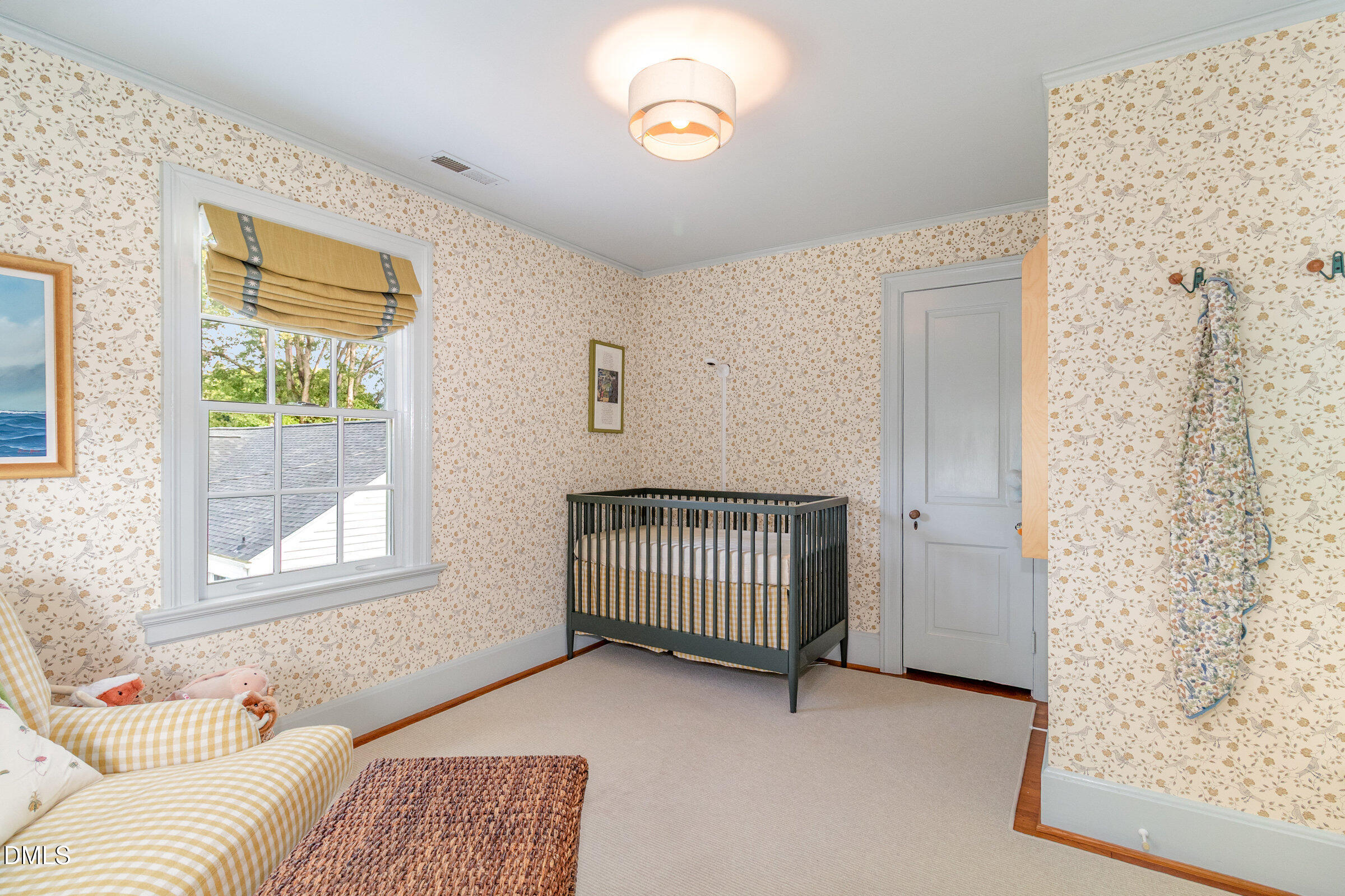 2404 Beechridge Road Raleigh, NC 27608 - Photo 29 of 52 a bedroom with a bed and a window