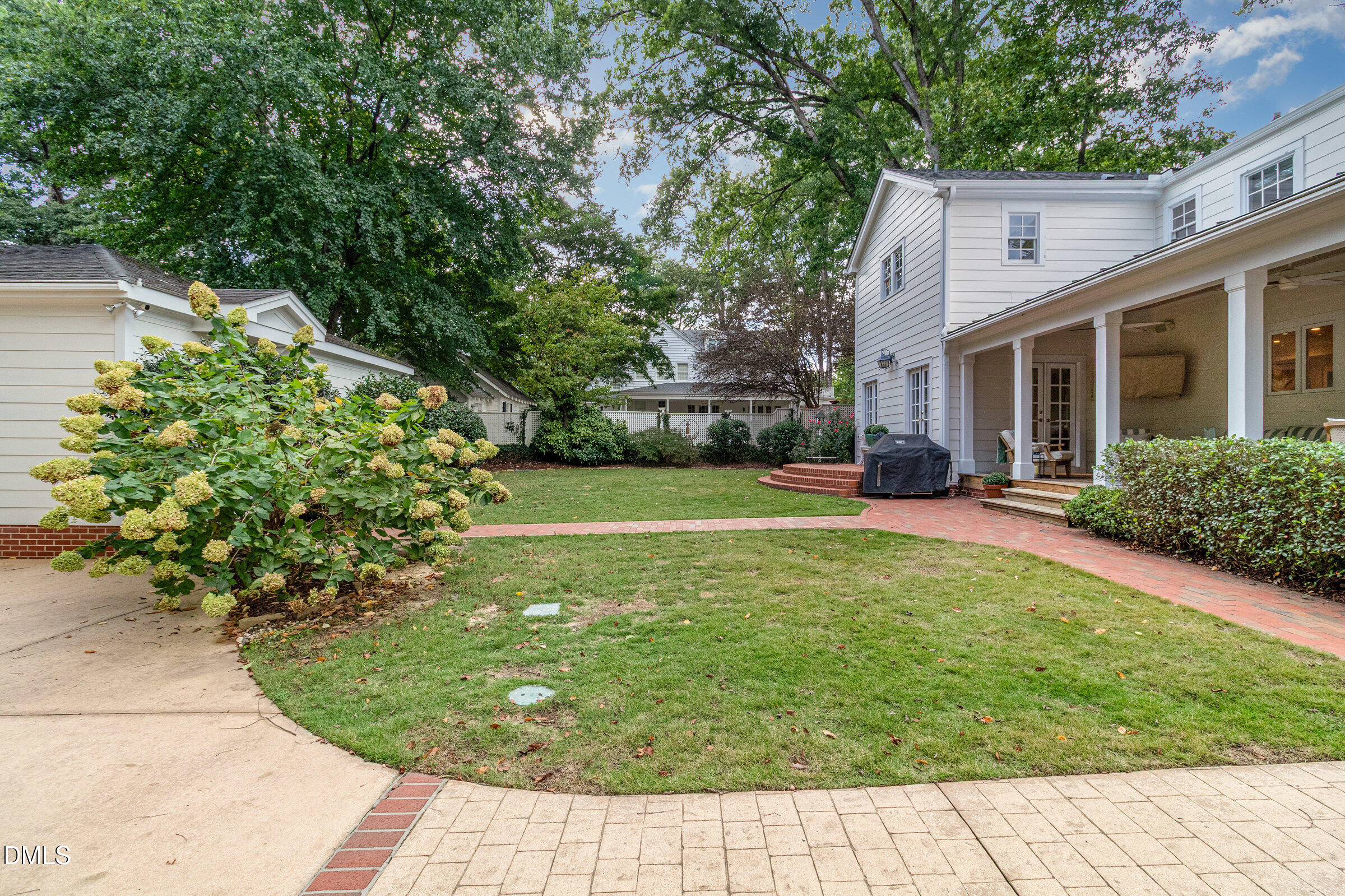 2404 Beechridge Road Raleigh, NC 27608 - Photo 39 of 52 a view of a house with a backyard