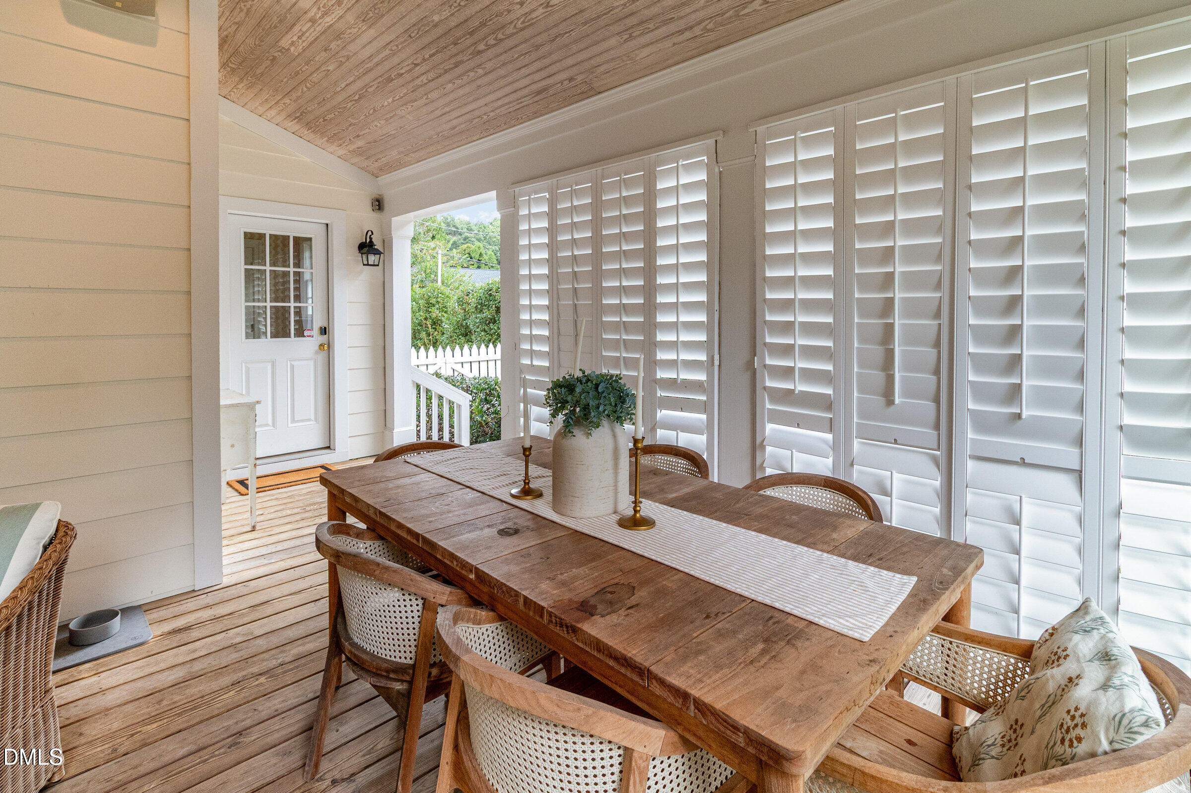 2404 Beechridge Road Raleigh, NC 27608 - Photo 6 of 52 a view of a dining room with furniture window and outside view