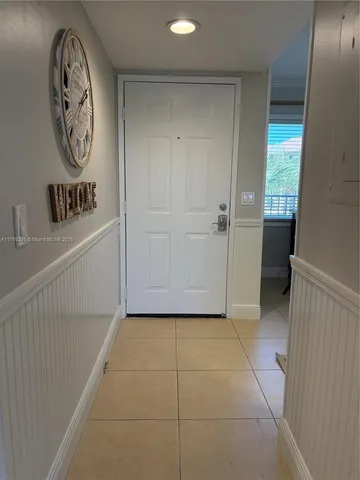 a view of a hallway with elevator