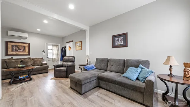 a living room with furniture and a couch