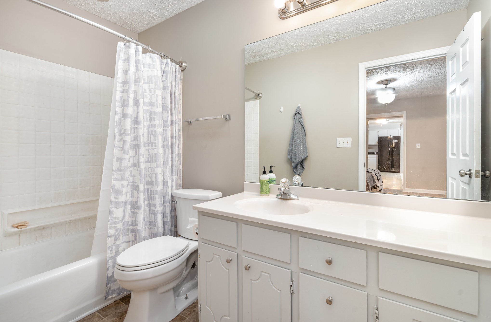 1176 Petty Road White Bluff, TN 37187 - Photo 11 of 23 a bathroom with a sink a toilet and shower