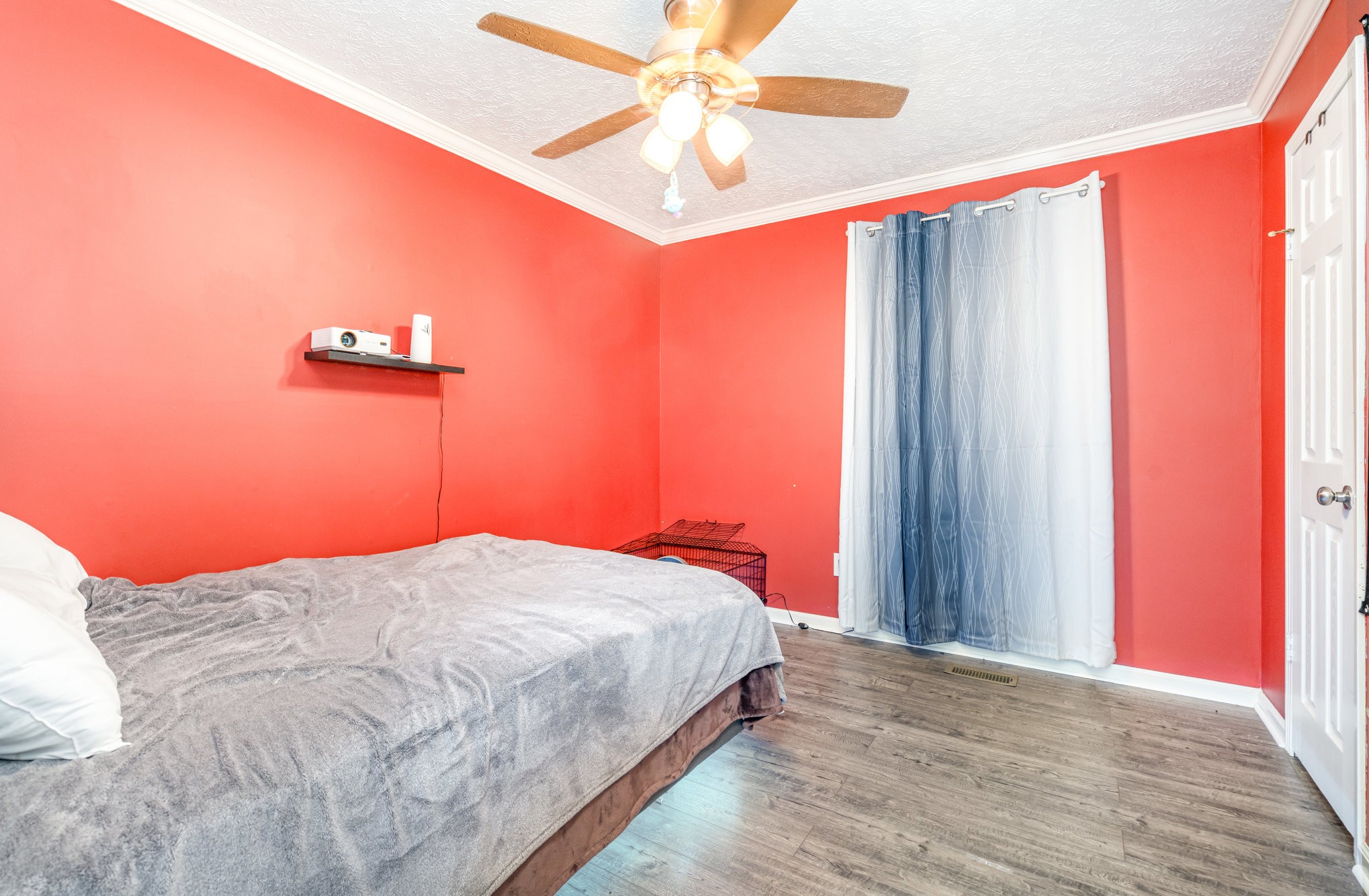 1176 Petty Road White Bluff, TN 37187 - Photo 13 of 23 a bedroom with a bed and a chandelier