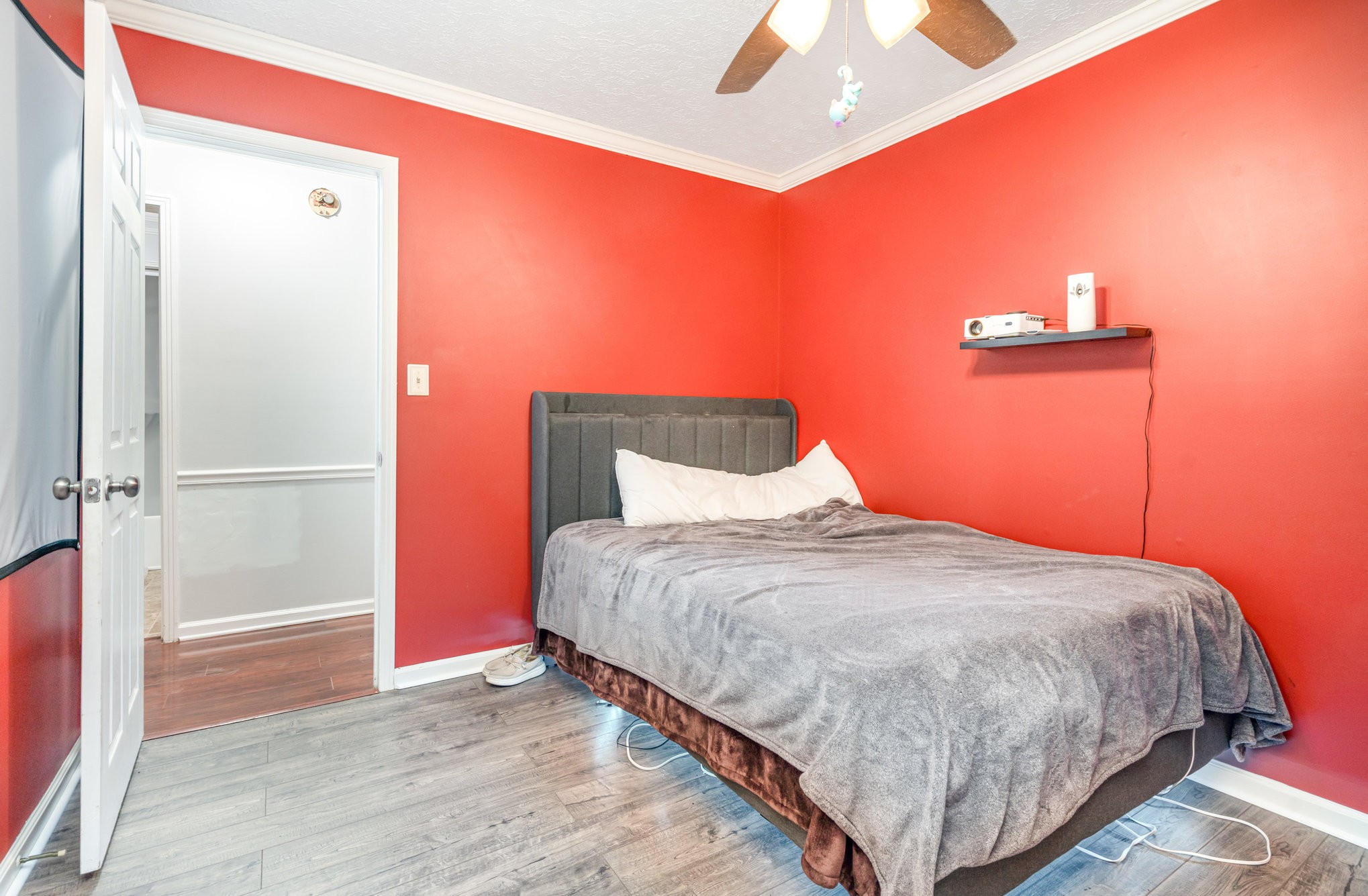 1176 Petty Road White Bluff, TN 37187 - Photo 14 of 23 a bedroom with a bed and a potted plant