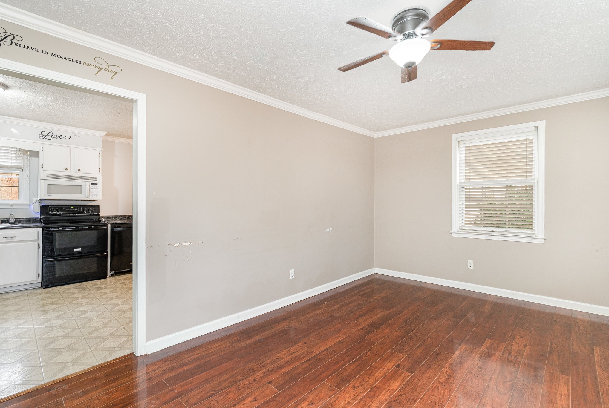 1176 Petty Road White Bluff, TN 37187 - Photo 4 of 23 wooden floor in an empty room with a window