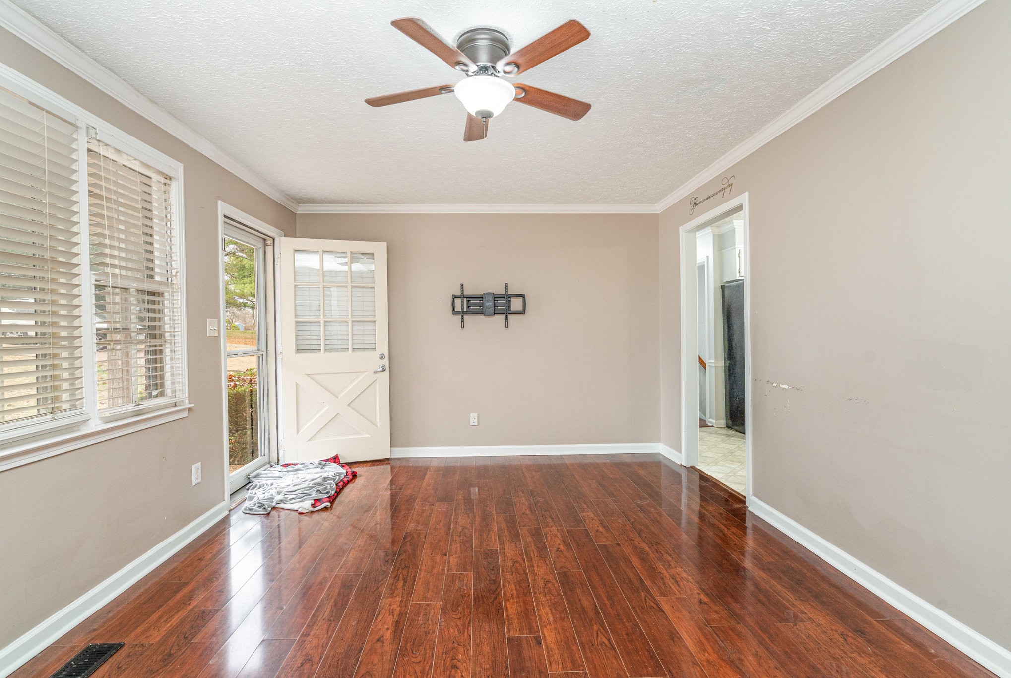 1176 Petty Road White Bluff, TN 37187 - Photo 5 of 23 wooden floor in an empty room with a window