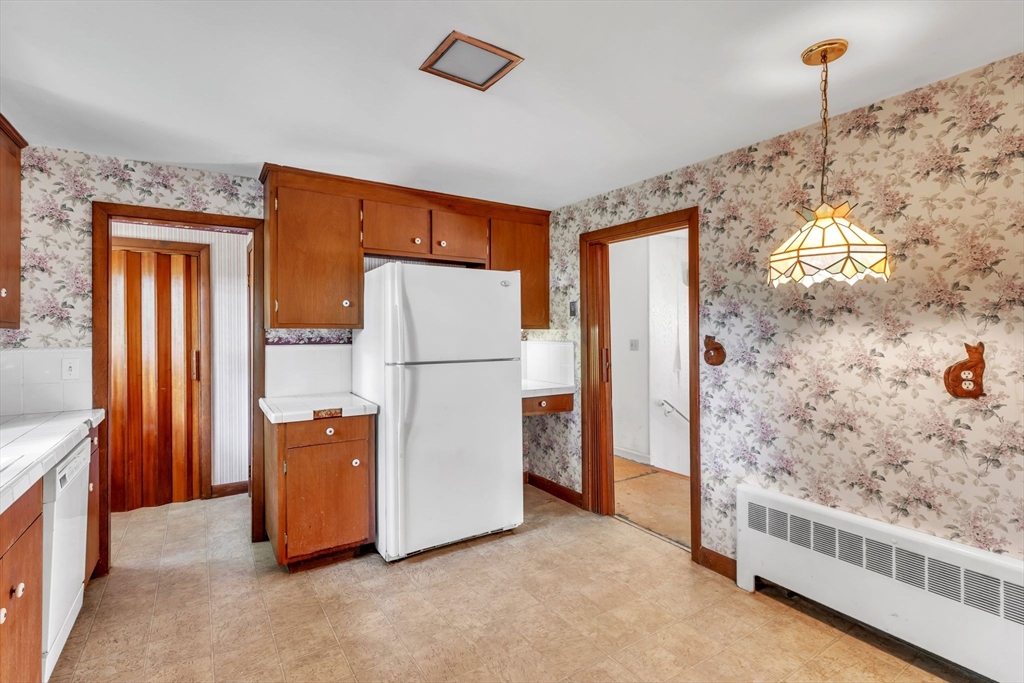 4 Birch Road Swampscott, MA 01907 - Photo 14 of 42 a view of kitchen with furniture and refrigerator