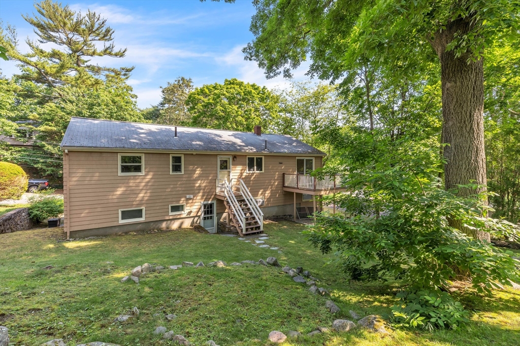 4 Birch Road Swampscott, MA 01907 - Photo 34 of 42 a view of a chair and table in backyard of the house