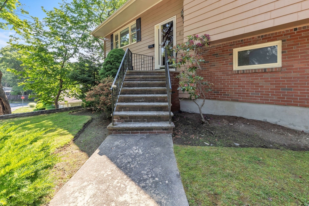 4 Birch Road Swampscott, MA 01907 - Photo 4 of 42 a view of a pathway with a yard