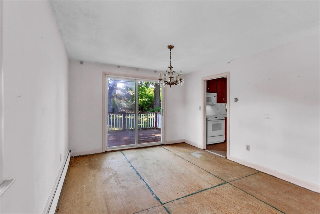 4 Birch Road Swampscott, MA 01907 - Photo 8 of 42 a view of a room with a chandelier and window