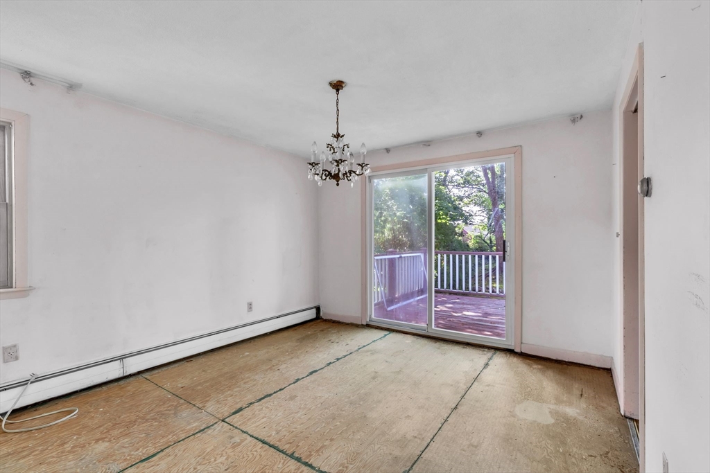 4 Birch Road Swampscott, MA 01907 - Photo 9 of 42 a view of a room with a chandelier and window