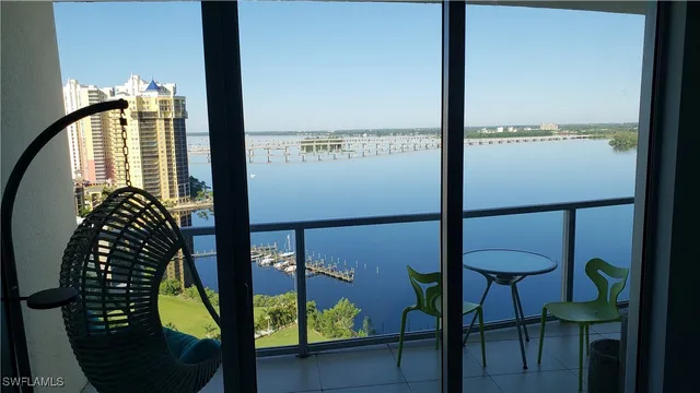 a view of swimming pool from a balcony