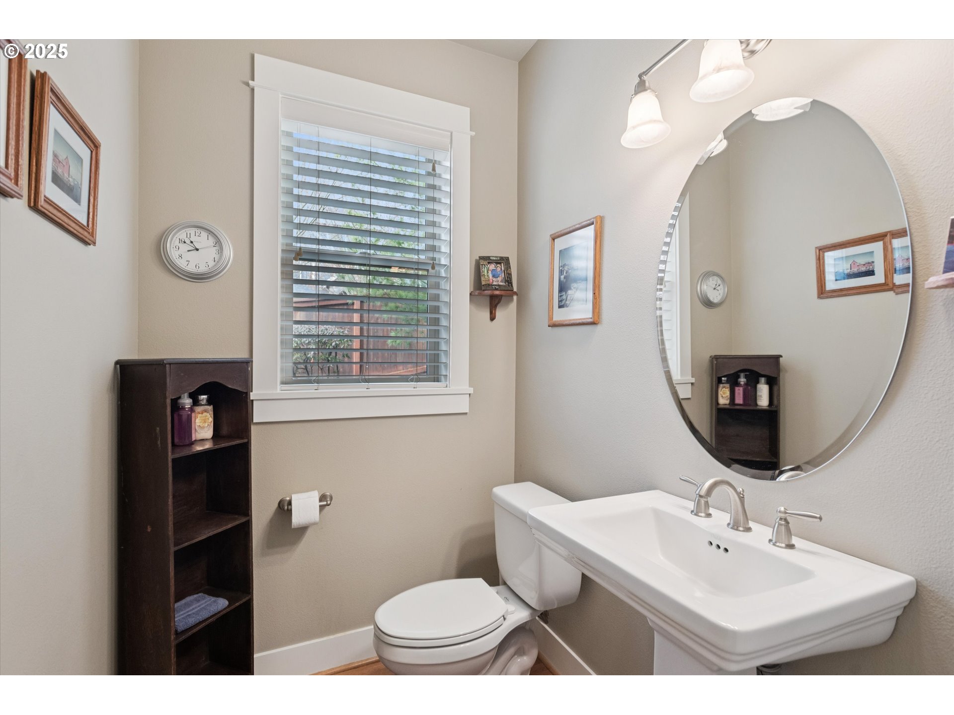 3041 Winkel Way West Linn, OR 97068 - Photo 18 of 45 a bathroom with a toilet sink and mirror