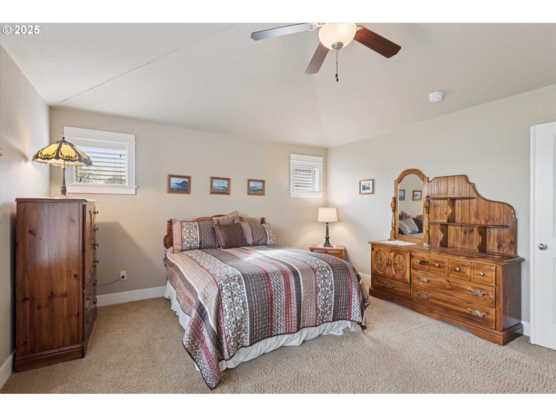 3041 Winkel Way West Linn, OR 97068 - Photo 22 of 45 a bedroom with a bed and wooden floor