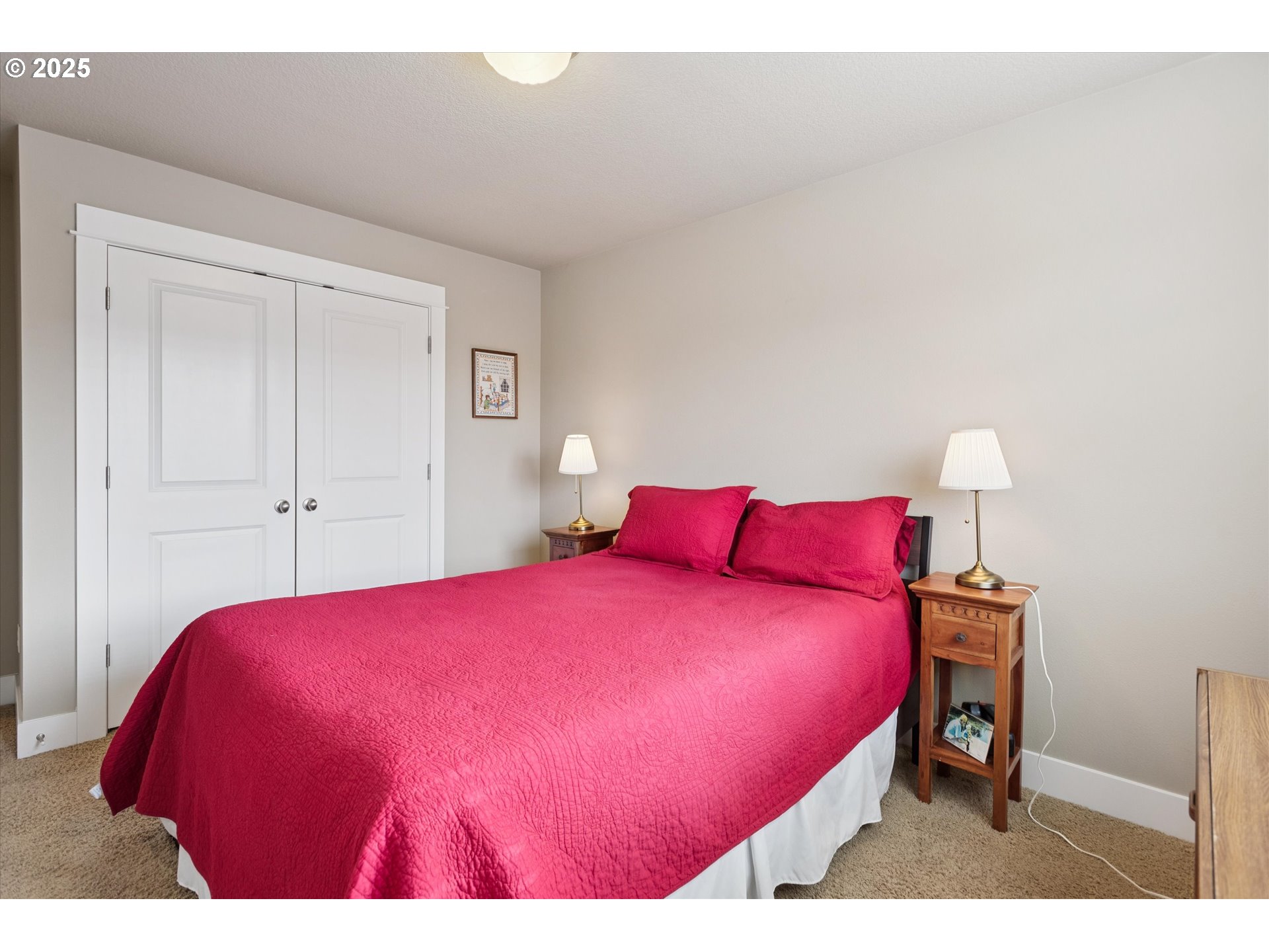 3041 Winkel Way West Linn, OR 97068 - Photo 29 of 45 a bedroom with a bed and a lamp