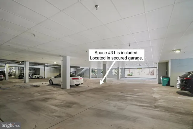 a view of a hallway with a room