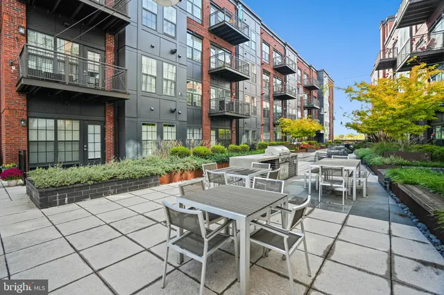 a view of a building with a yard