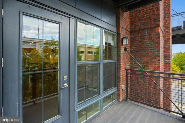 a view of a building from a balcony