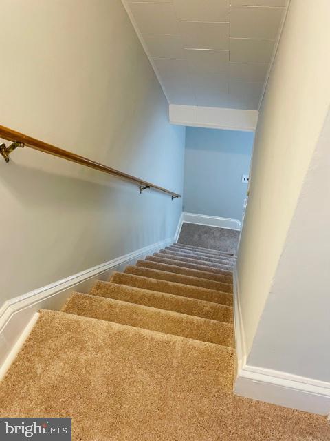 7030 Dunbar Road Baltimore, MD 21222 - Photo 16 of 20 Stairs leading to lower level