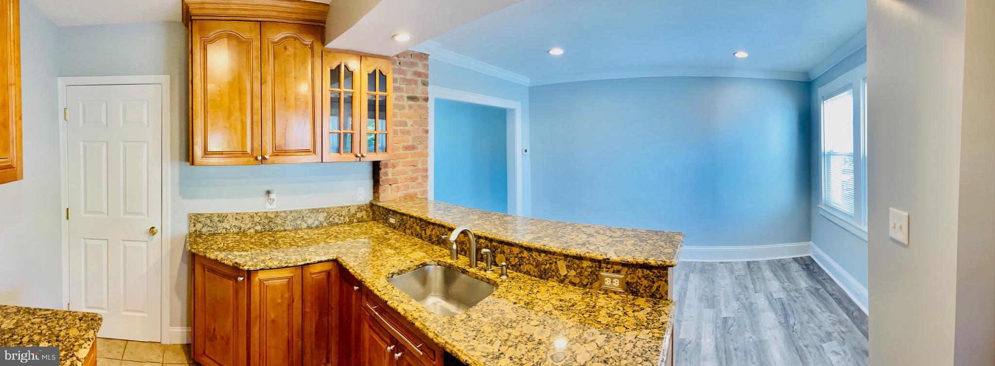 7030 Dunbar Road Baltimore, MD 21222 - Photo 10 of 20 Kitchen flows into dining area