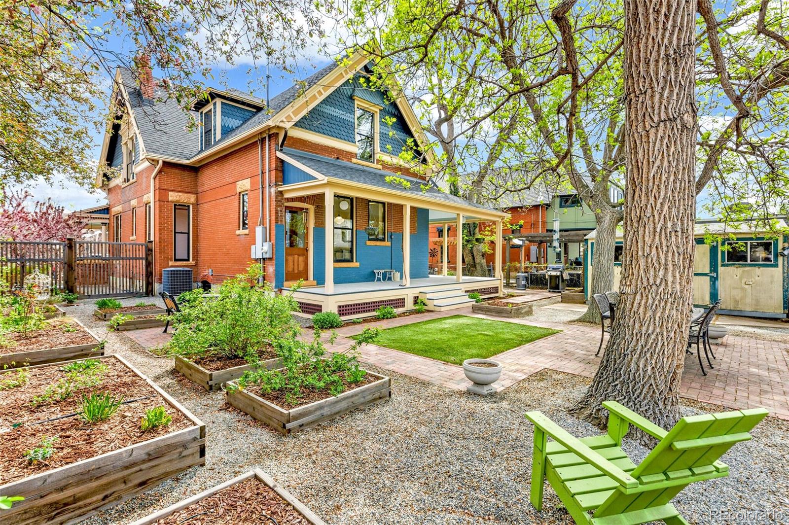 2851 Perry Street Denver, CO 80212 - Photo 45 of 50 a front view of a house with garden