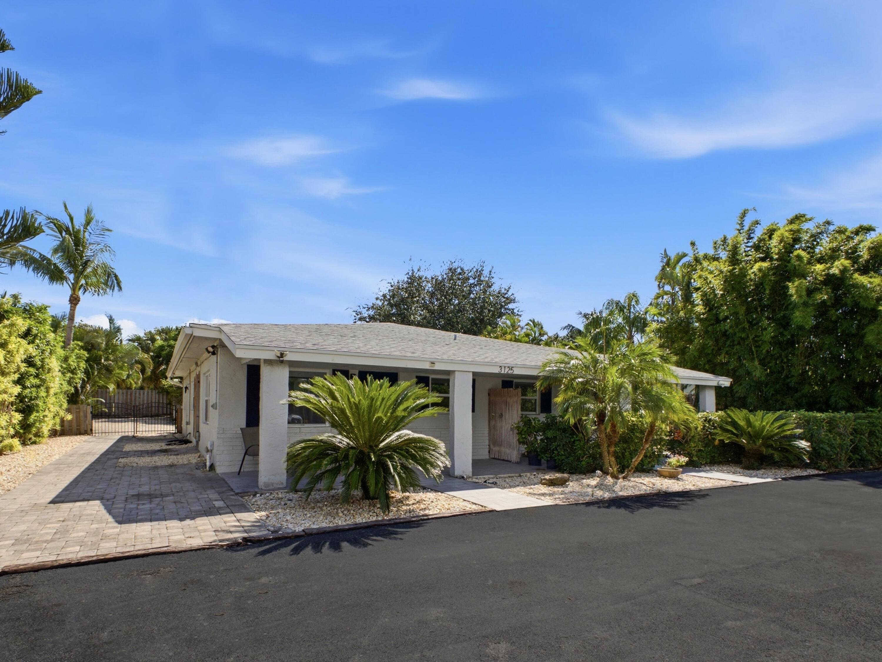 3125 Albatross Road Delray Beach, FL 33444 - Photo 2 of 26 Building Front 2