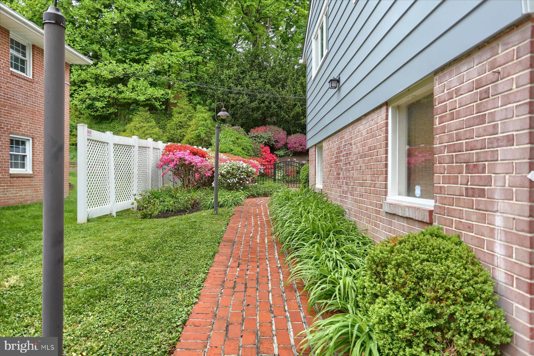 6002 Roland Avenue Baltimore, MD 21210 - Photo 37 of 49 Walkway leading to side door