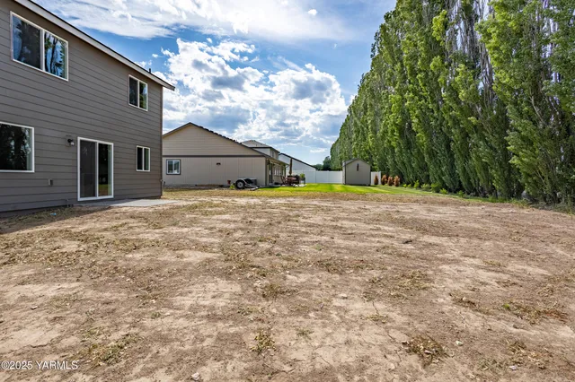 a house with trees in front of it