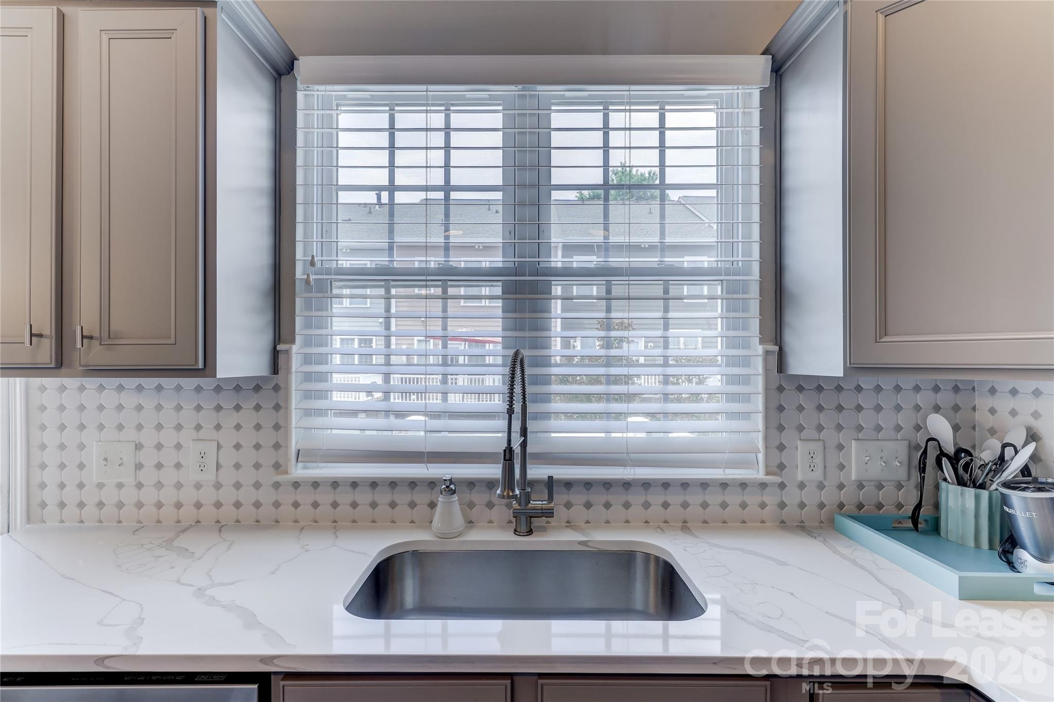 905 Lyndley Drive Fort Mill, SC 29708 - Photo 18 of 42 a kitchen with a sink and a window