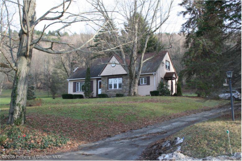 181 Falls Road Falls, PA 18615 - Photo 1 of 16 a view of a house with a yard