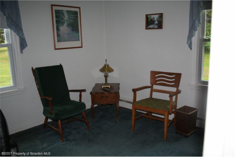 181 Falls Road Falls, PA 18615 - Photo 12 of 16 a living room with furniture and a window