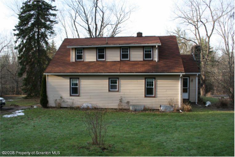 181 Falls Road Falls, PA 18615 - Photo 16 of 16 a front view of house with yard and green space