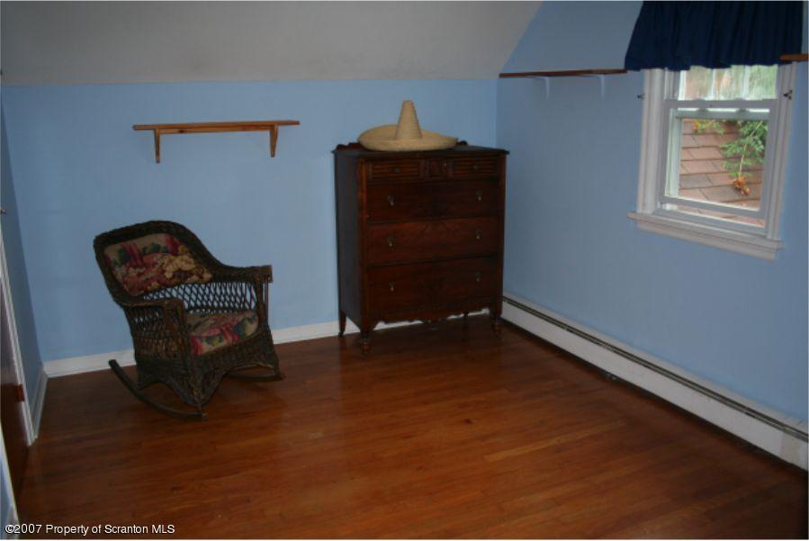 181 Falls Road Falls, PA 18615 - Photo 10 of 16 a living room with furniture and a window